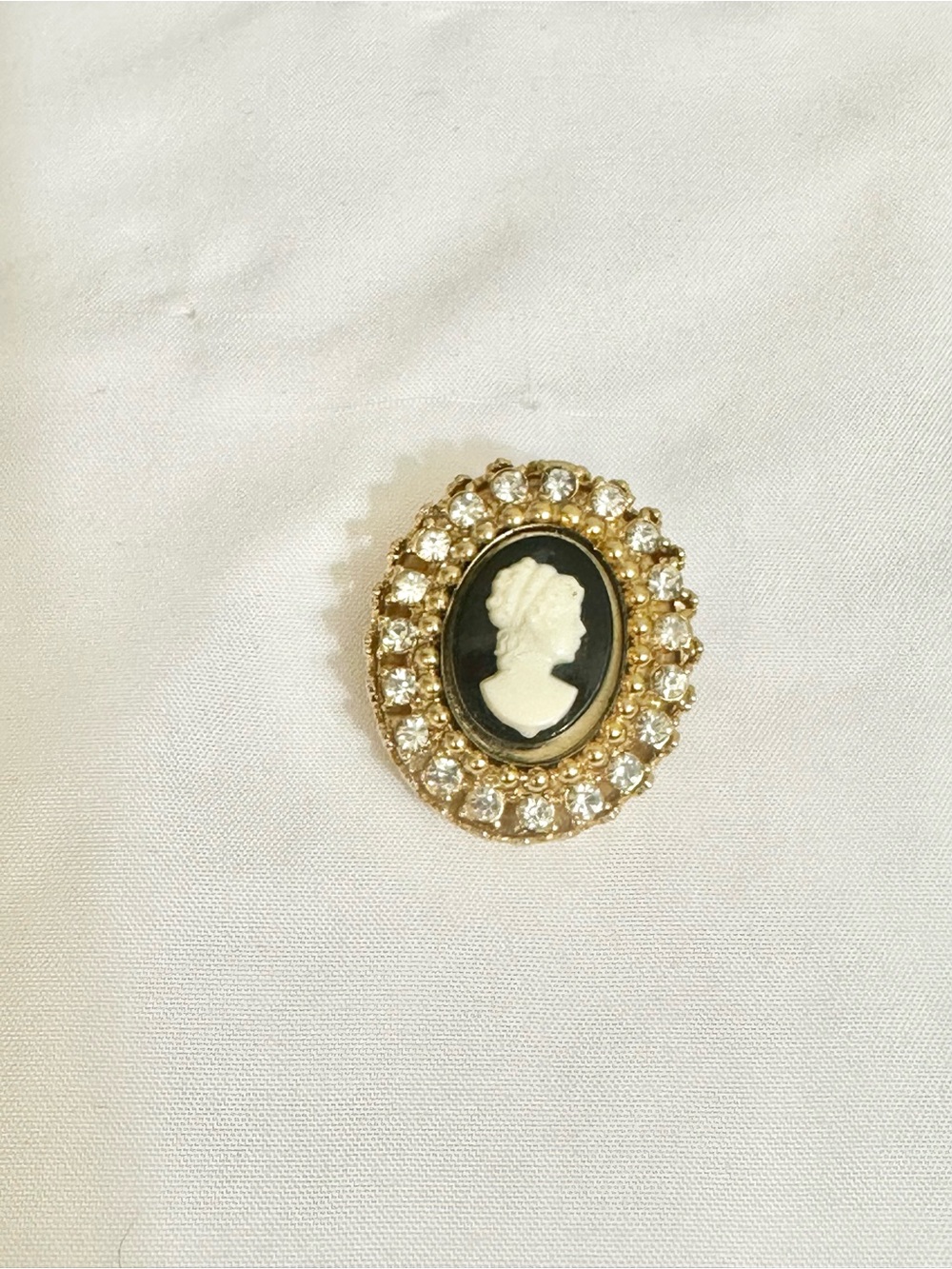 Gold Cameo Brooch with Black and White Profile